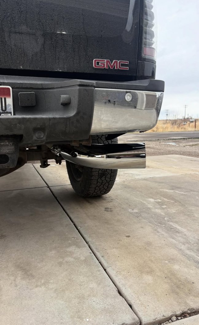 Rear view of a GMC truck exhaust upgrade